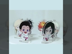 Chaîne de clés de Noël personnalisée avec anneau métallique et impression transparente de bonhomme de neige