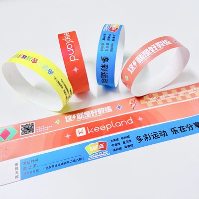 Des bracelets pour événements en papier à taille réglable imprimables en couleurs néon