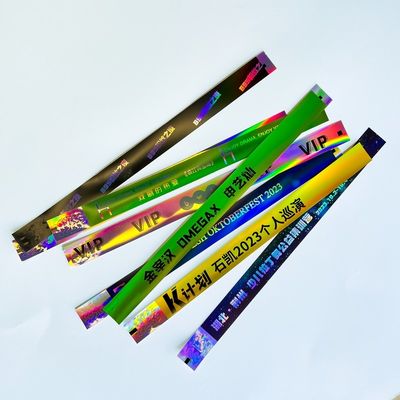 Des bracelets à l'usage unique au néon laser Rainbow Glitter pour les fêtes